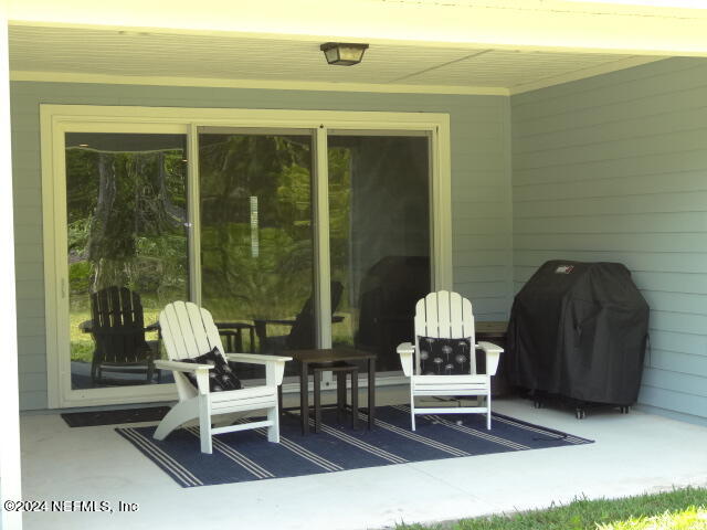 69 Trewin Circle St. Augustine, FL 32092 - Photo 32 of 36 a living room with furniture