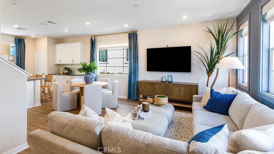 1700 Phantom Lane Rialto, CA 92376 - Photo 6 of 23 a living room with furniture and a flat screen tv