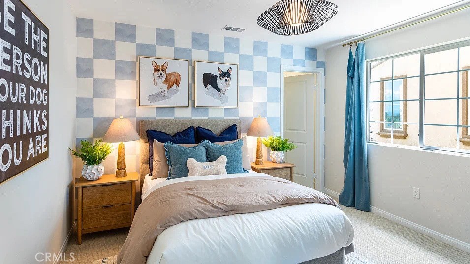 1700 Phantom Lane Rialto, CA 92376 - Photo 9 of 23 a bedroom with a bed and a painting on the wall