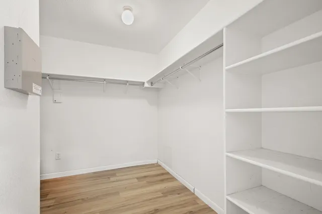 a view of an empty walk in closet