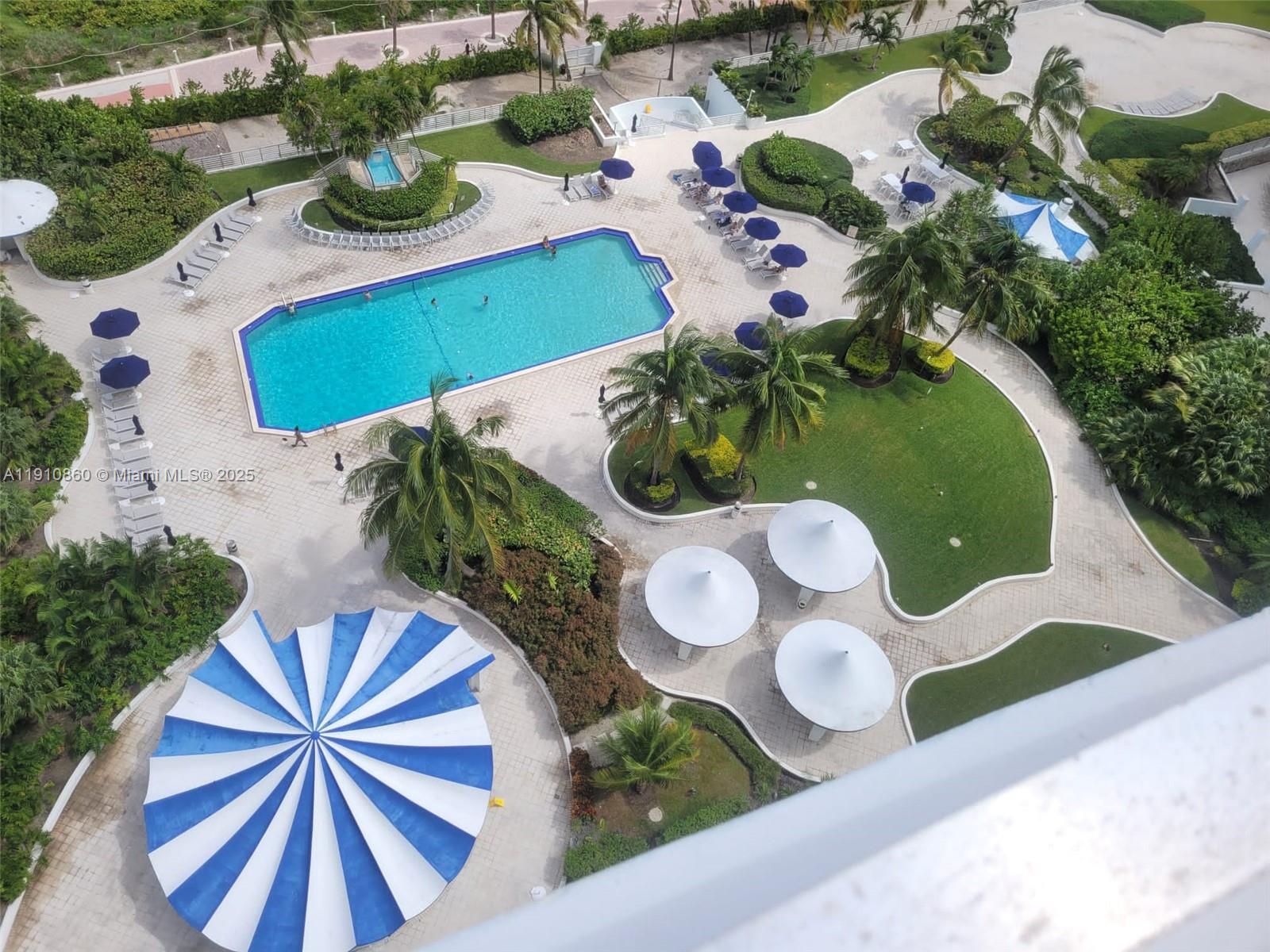 5161 Collins Avenue, Unit 214 Miami Beach, FL 33140 - Photo 13 of 13 an aerial view of a swimming pool