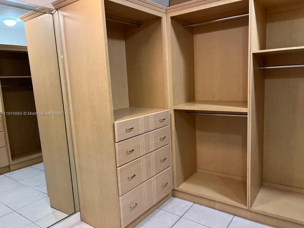 5161 Collins Avenue, Unit 214 Miami Beach, FL 33140 - Photo 8 of 13 a view of a dresser