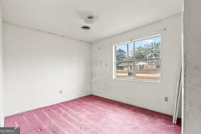 an empty room with a window