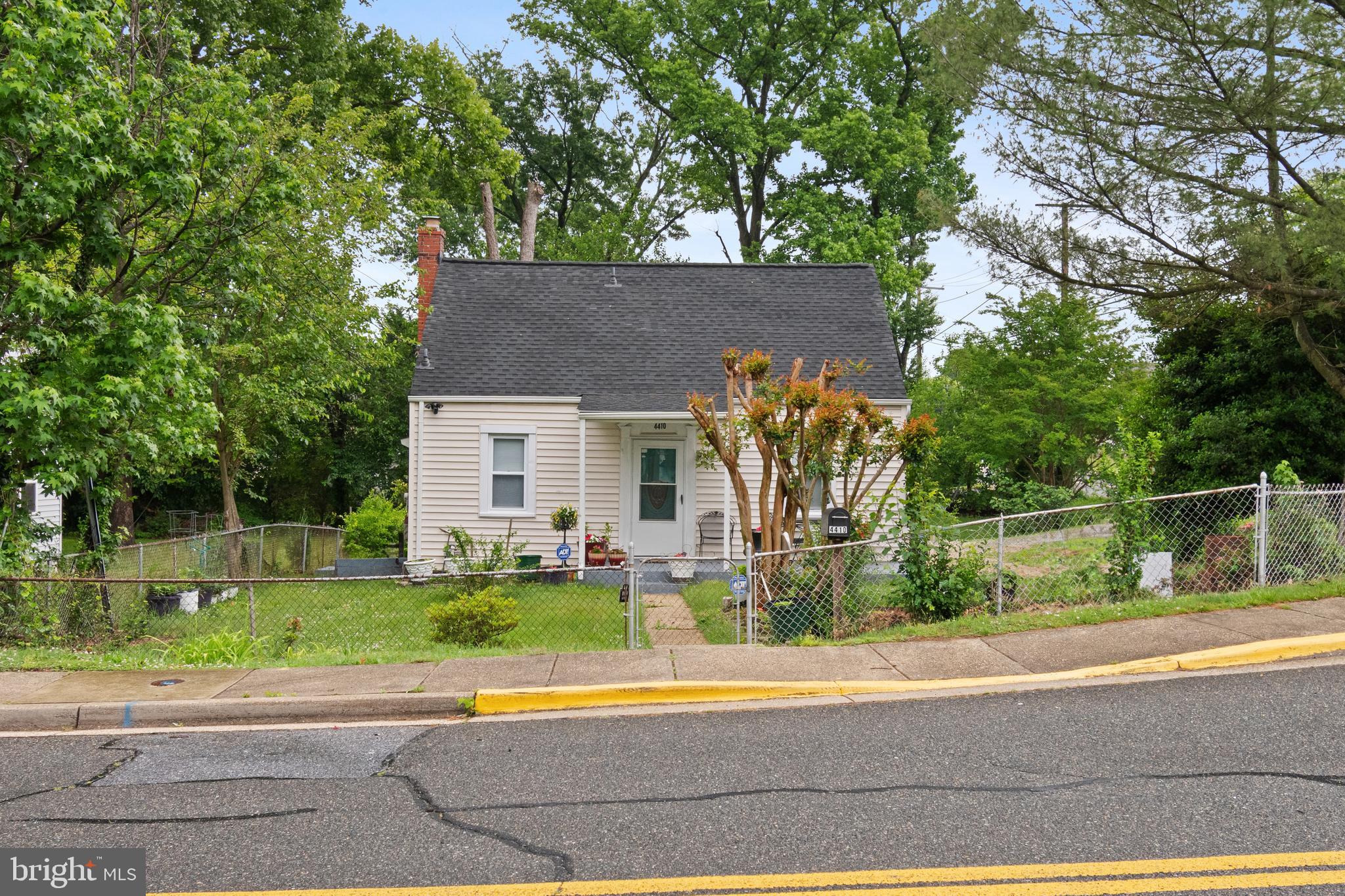 4410 Allies Road Suitland, MD 20746 - Photo 4 of 30 a view of a house with a yard and plants