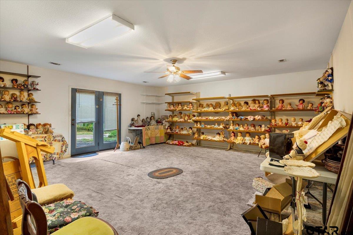 1302 Jeb Stuart Drive Tyler, TX 75703 - Photo 35 of 47 a view of a room with gym equipment