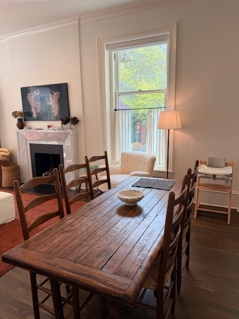 1300 North Ritchie Court, Unit 1 Chicago, IL 60610 - Photo 3 of 10 a living room with furniture a fireplace and a flat screen tv
