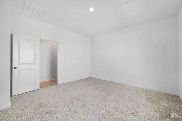 an empty room with an entryway