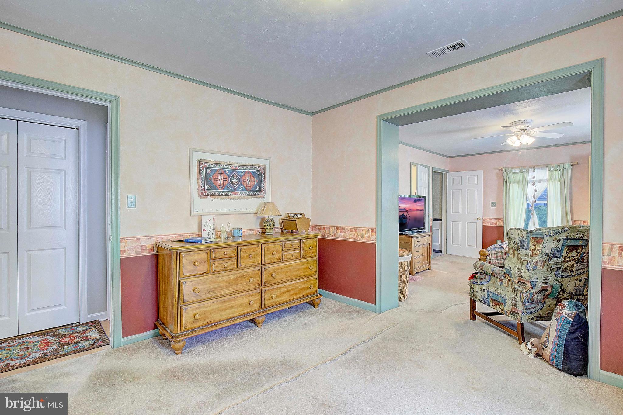 706 Kingfisher Road Deale, MD 20751 - Photo 15 of 30 a bed room with a bed and a furniture