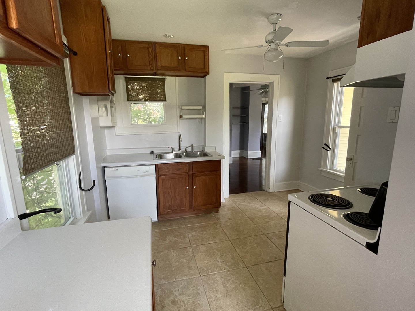 308 South Washington Street Wheaton, IL 60187 - Photo 14 of 27 a kitchen with a sink appliances and cabinets