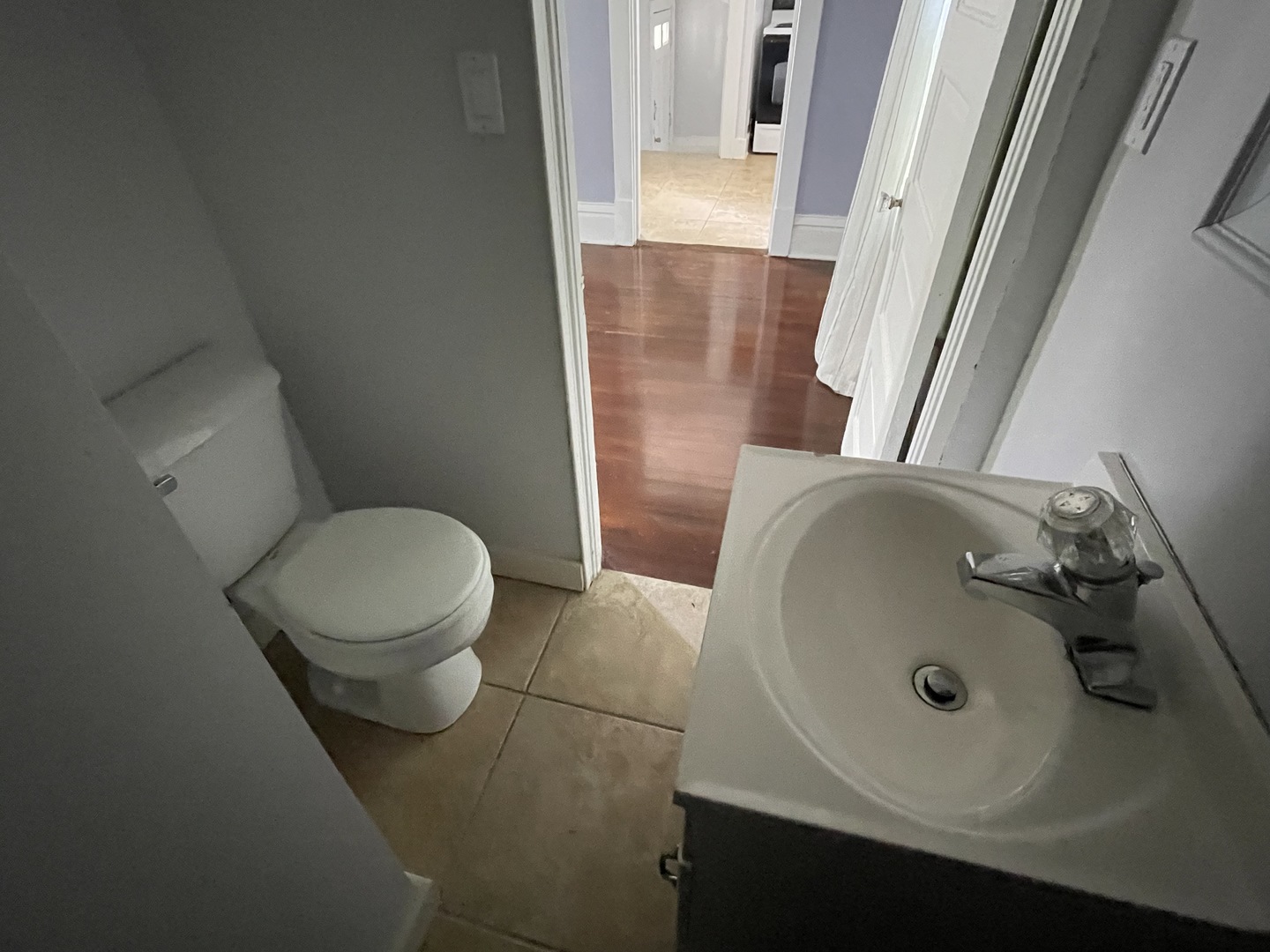 308 South Washington Street Wheaton, IL 60187 - Photo 16 of 27 a bathroom with a sink and a mirror
