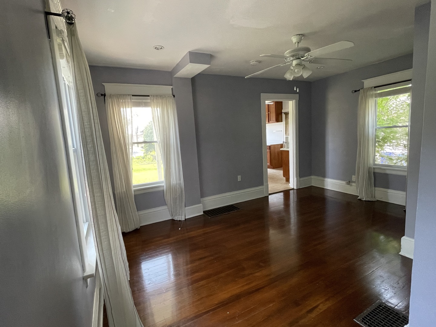 308 South Washington Street Wheaton, IL 60187 - Photo 9 of 27 a view of livingroom with furniture wooden floor and window