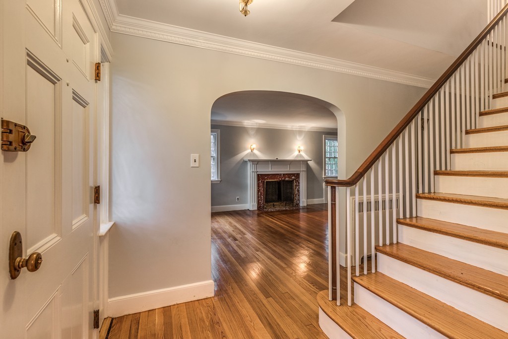 24 Gordon Road Milton, MA 02186 - Photo 6 of 30 a view of entryway and hall with wooden floor