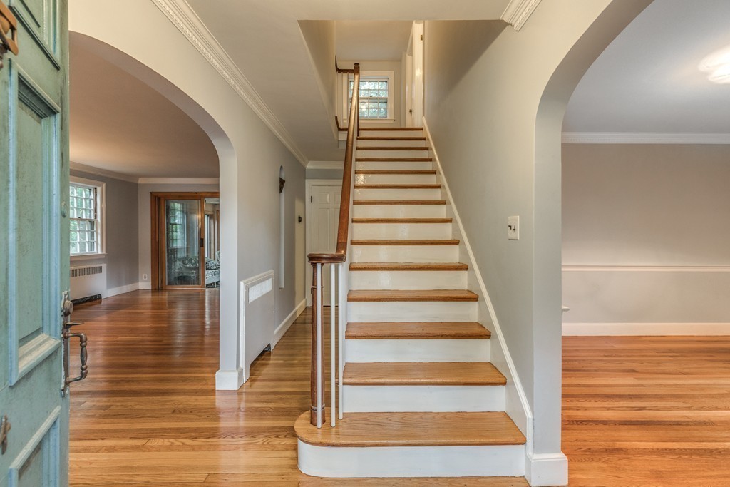 24 Gordon Road Milton, MA 02186 - Photo 7 of 30 a view of entryway and hall with wooden floor