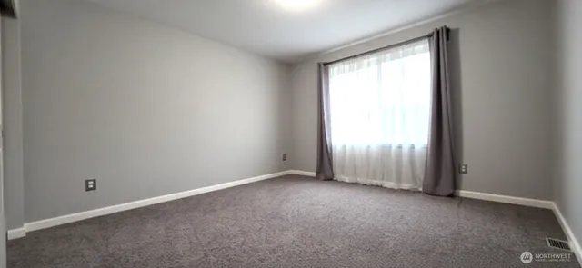 an empty room with a window