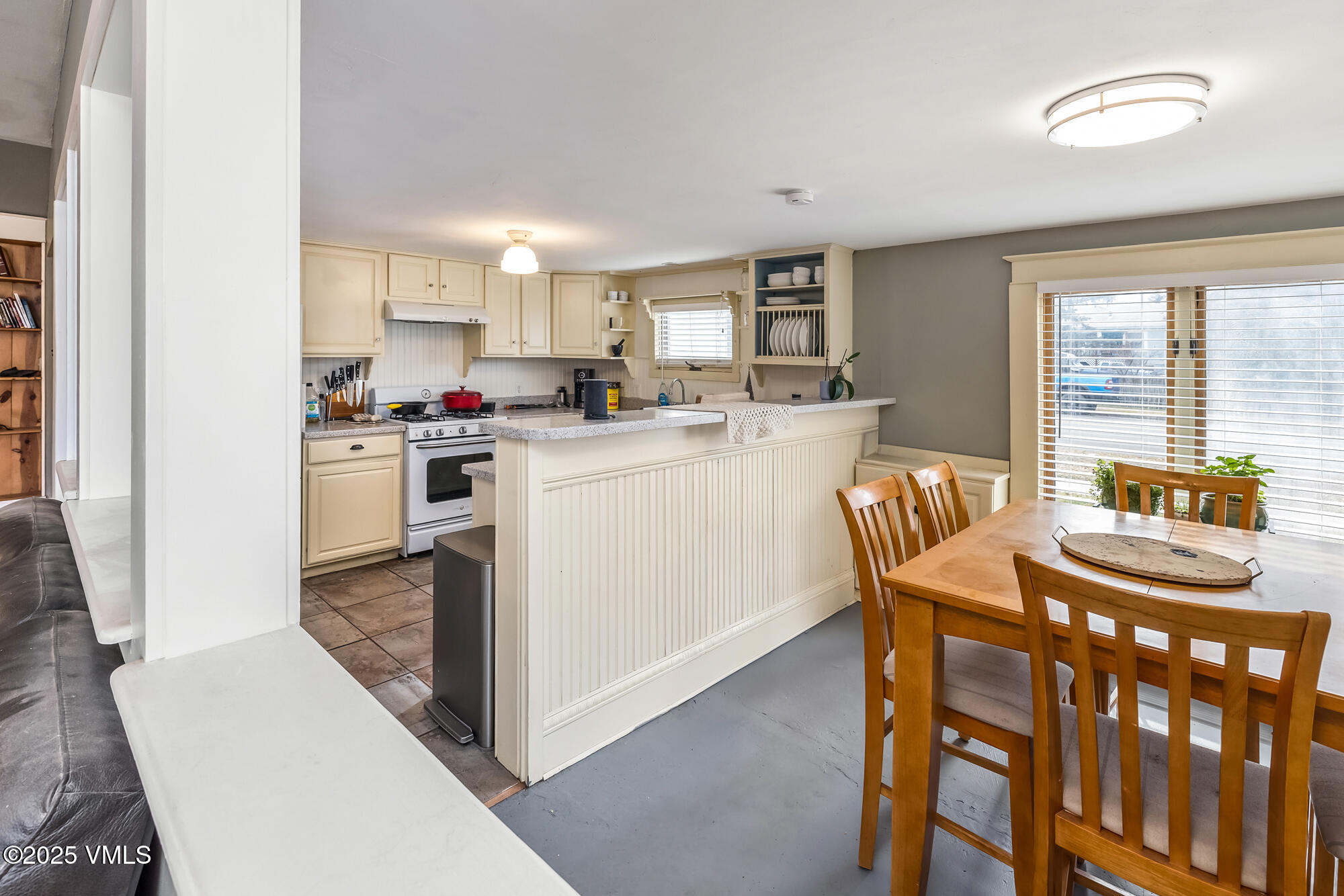246 Capitol Street Eagle, CO 81631 - Photo 11 of 31 a kitchen with a table and chairs in it