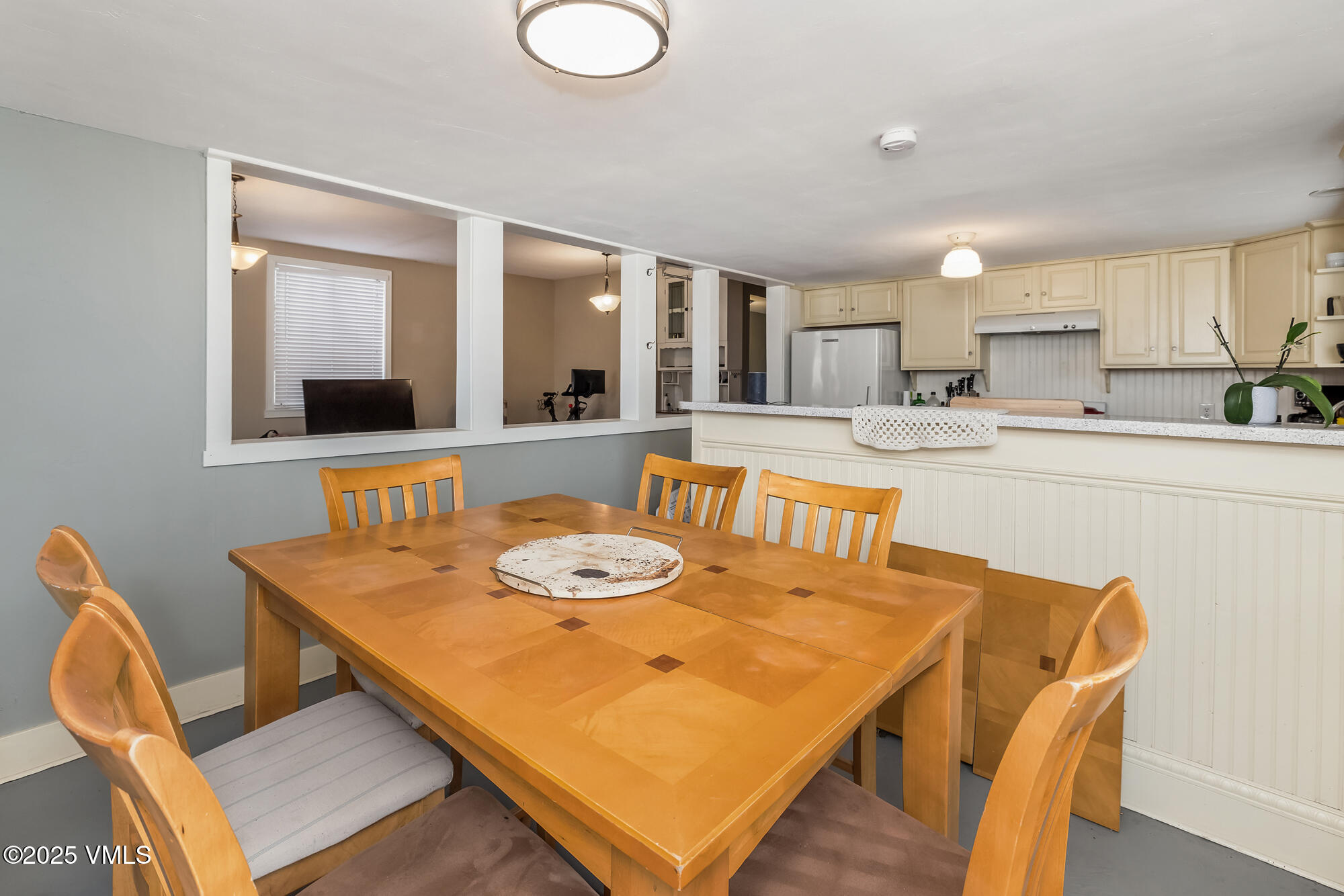 246 Capitol Street Eagle, CO 81631 - Photo 15 of 31 a view of a dining room with furniture and wooden floor
