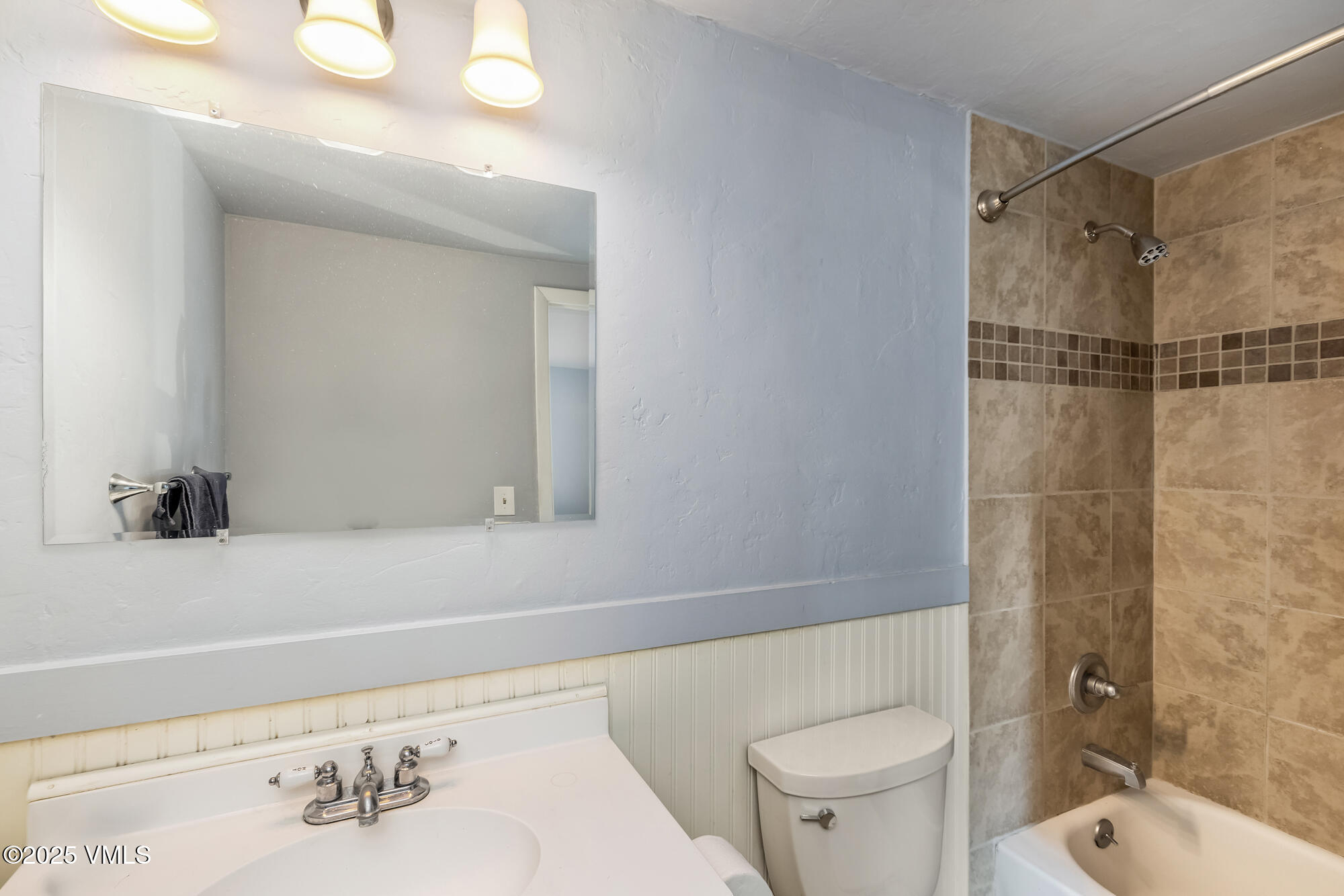 246 Capitol Street Eagle, CO 81631 - Photo 24 of 31 a bathroom with a sink a toilet and shower