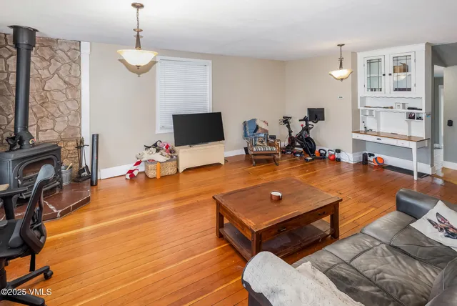 a room with furniture and a flat screen tv