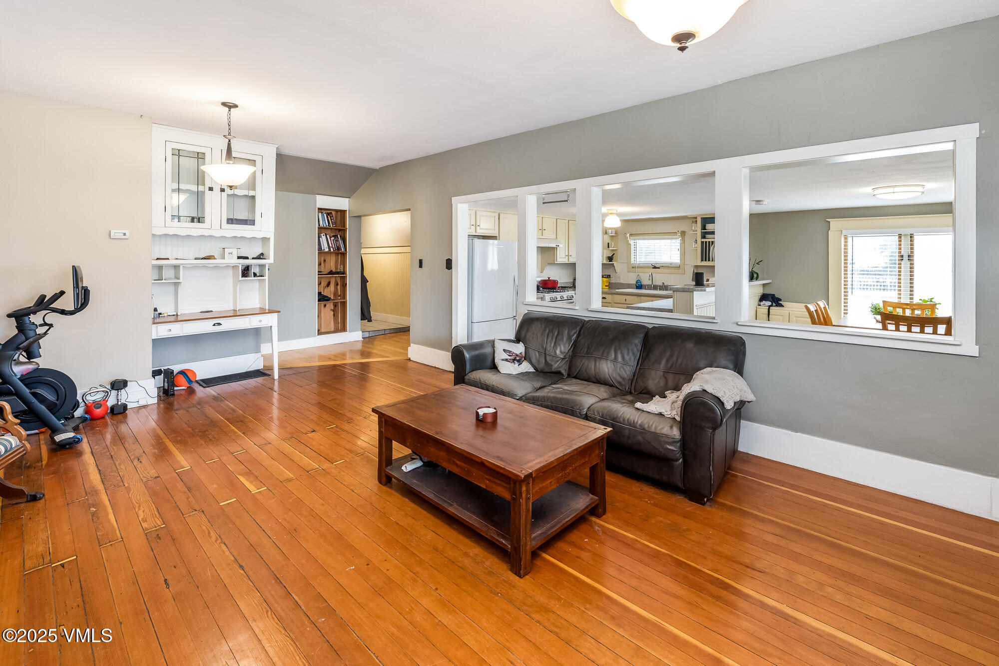 246 Capitol Street Eagle, CO 81631 - Photo 10 of 31 a living room with furniture and wooden floor
