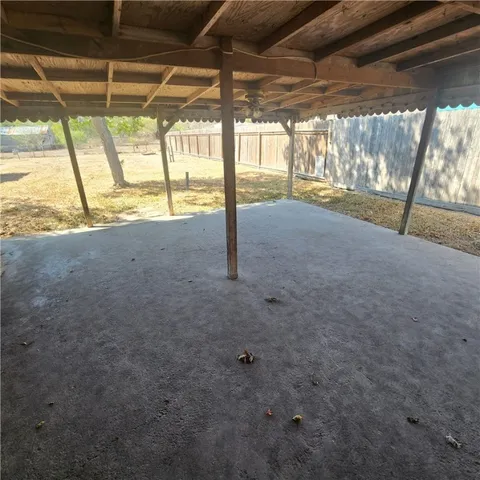 a view of an empty room with a sliding door