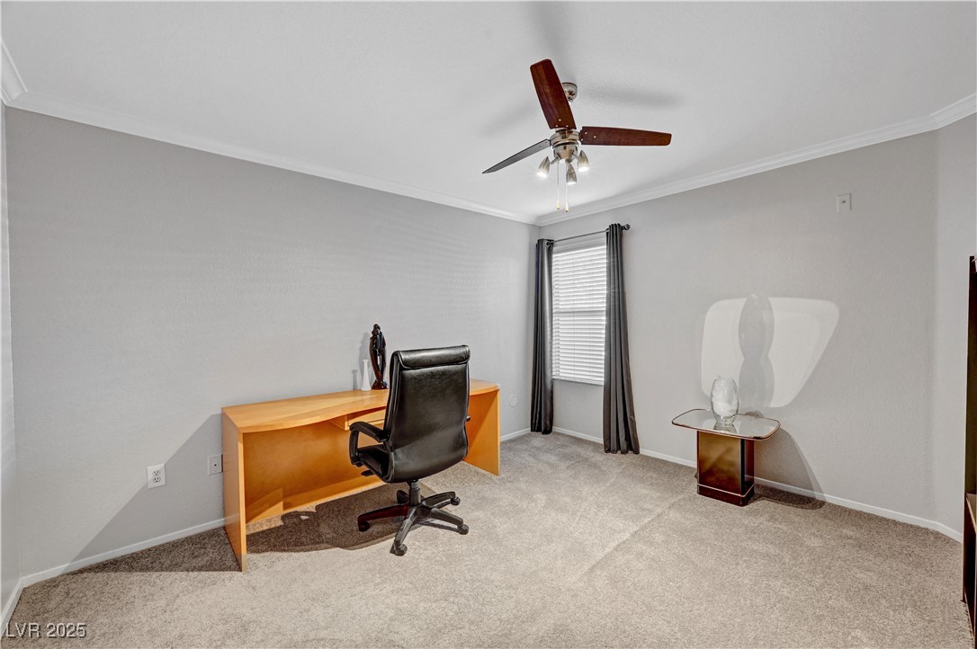 8101 West Flamingo Road, Unit 1163 Las Vegas, NV 89147 - Photo 20 of 45 Home office featuring crown molding, carpet, and a ceiling fan