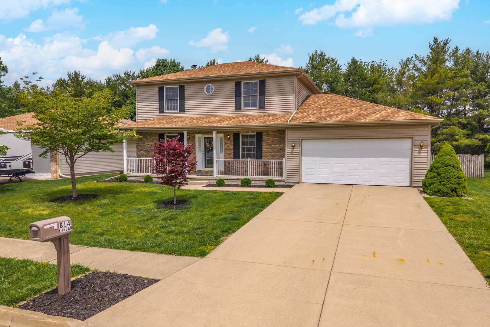 814 Landau Lane Normal, IL 61761 - Photo 58 of 58 a front view of a house with a yard and trees