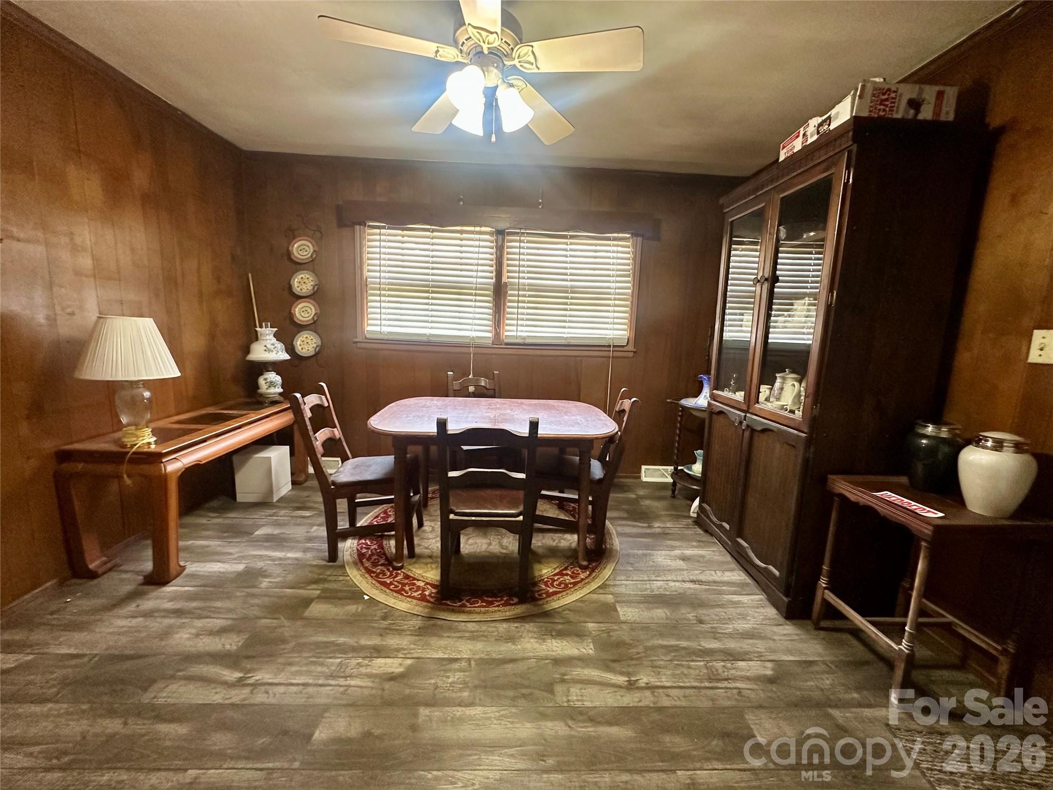 119 Stedman Road Dallas, NC 28034 - Photo 5 of 11 a bedroom with a bed and wooden floor