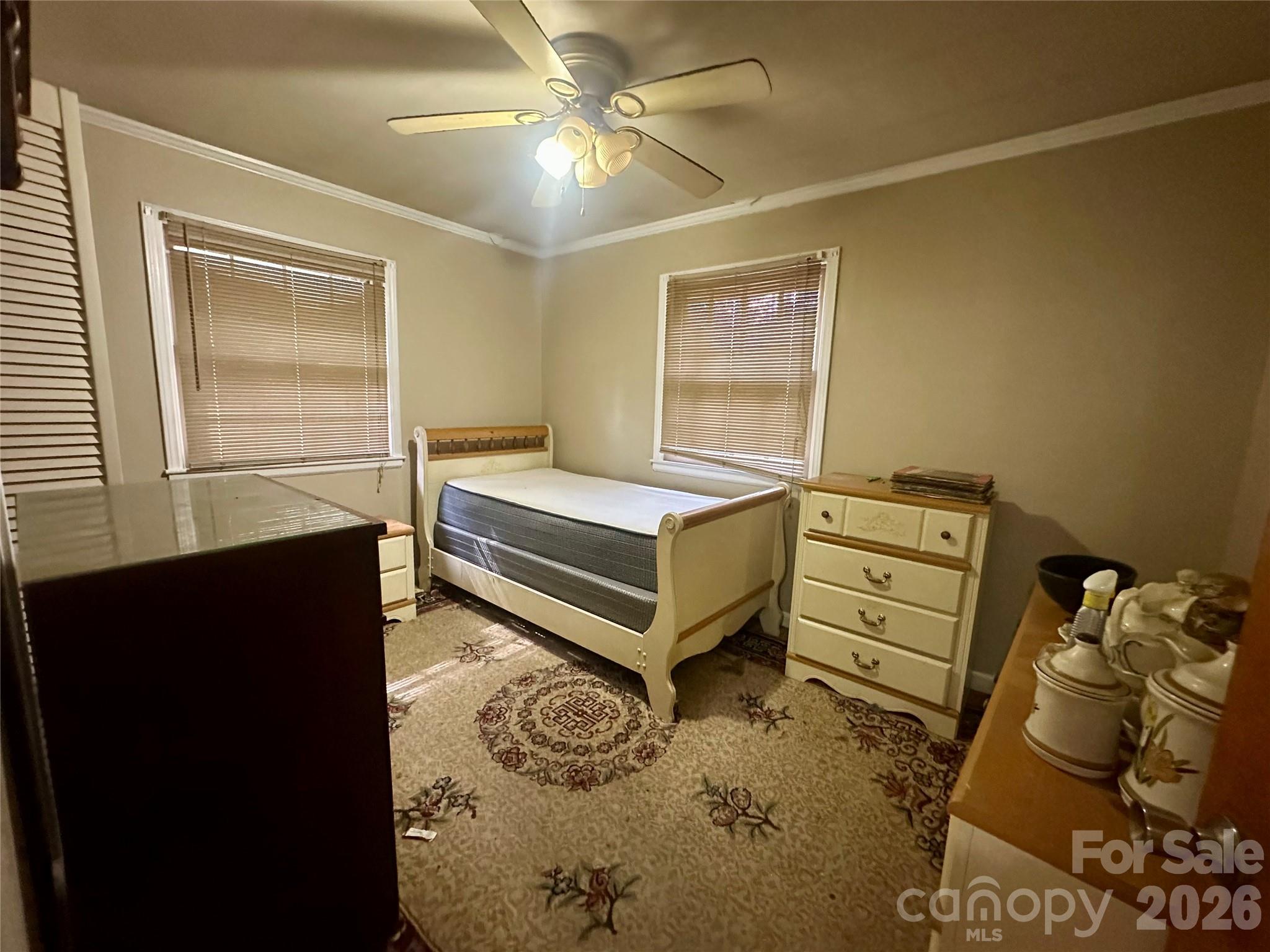 119 Stedman Road Dallas, NC 28034 - Photo 7 of 11 a bedroom with a bed and a window