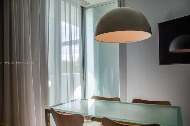 a view of a chair and table in a livingroom