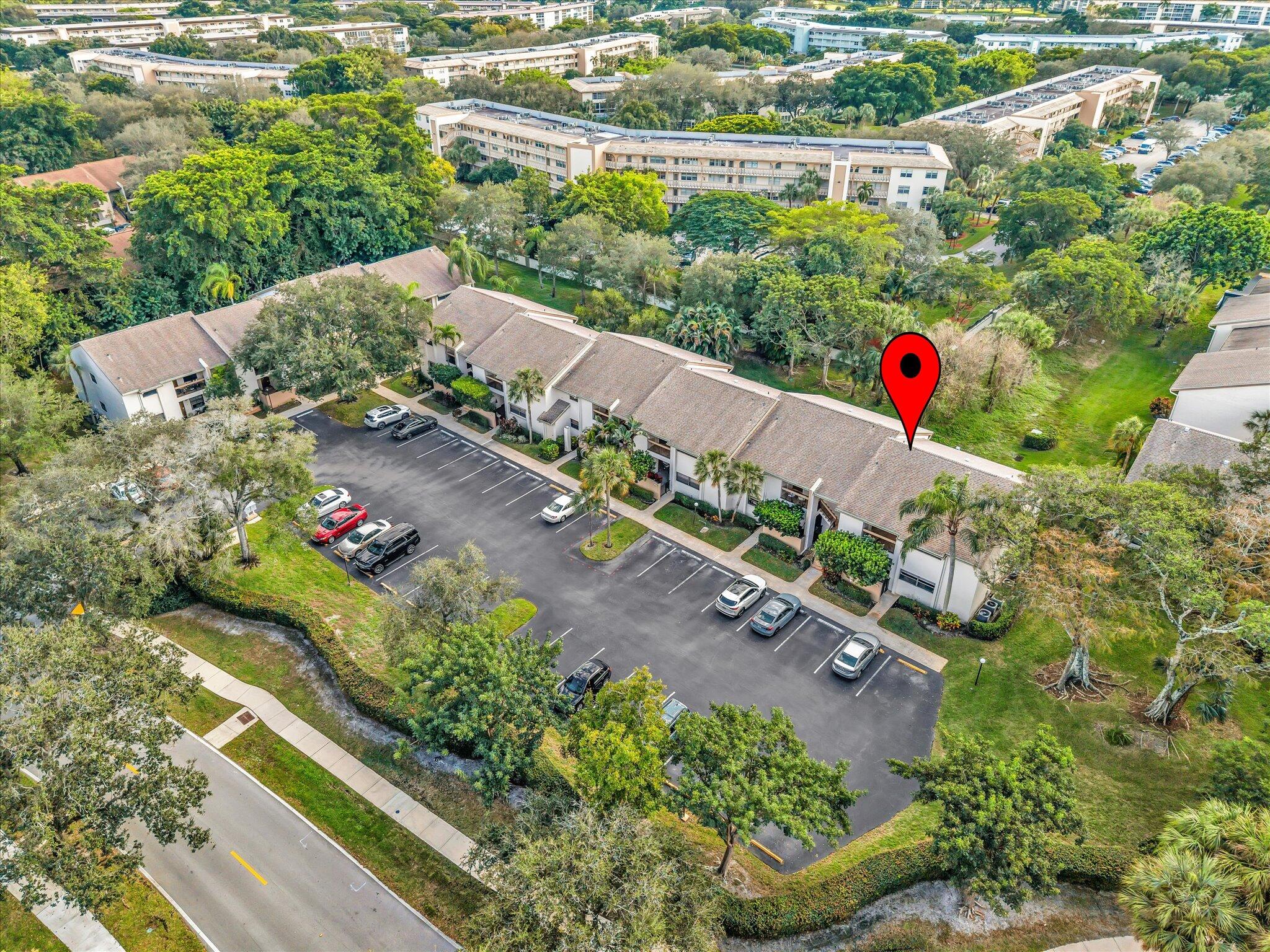 4441 Northwest 22nd Road, Unit 414 Coconut Creek, FL 33066 - Photo 56 of 60 an aerial view of a house