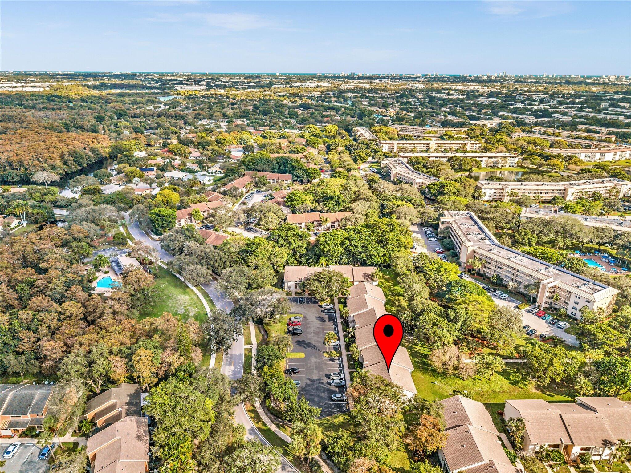 4441 Northwest 22nd Road, Unit 414 Coconut Creek, FL 33066 - Photo 57 of 60 view of city and ocean