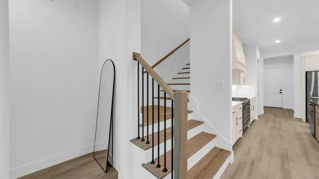 a view of entryway with wooden floor