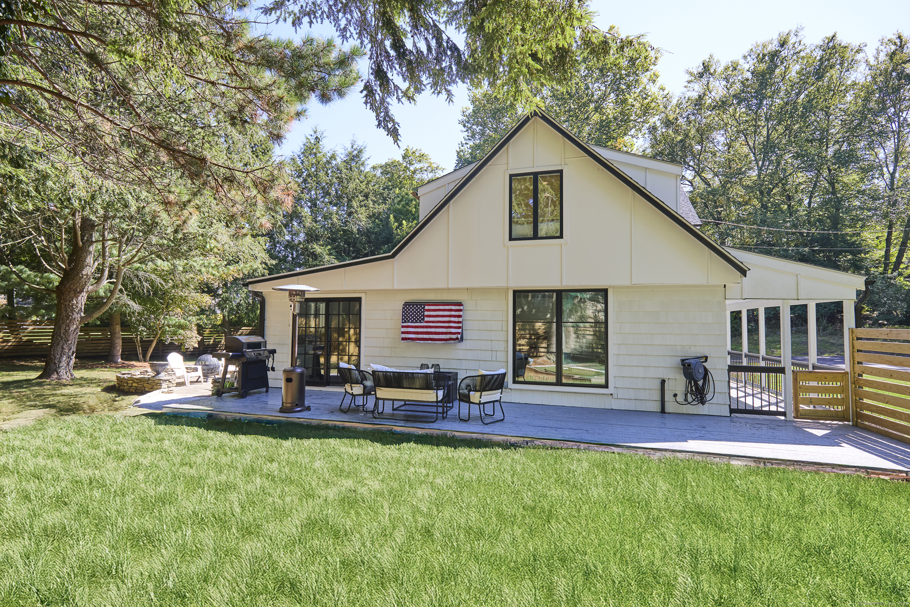1207 Stillson Road Fairfield, CT 06824 - Photo 36 of 39 a front view of house with yard and seating area