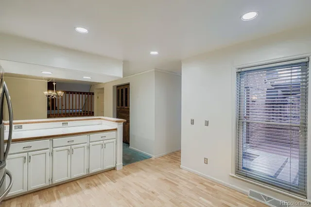 a bathroom with a sink a mirror and a shower