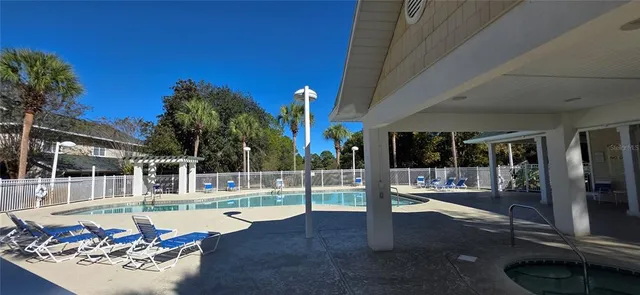 a view of a house with brick walls