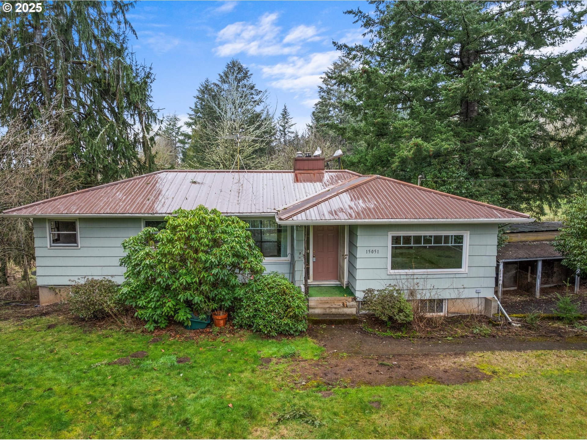 15051 Southeast Bluff Road Sandy, OR 97055 - Photo 1 of 41 front view of a house with a yard