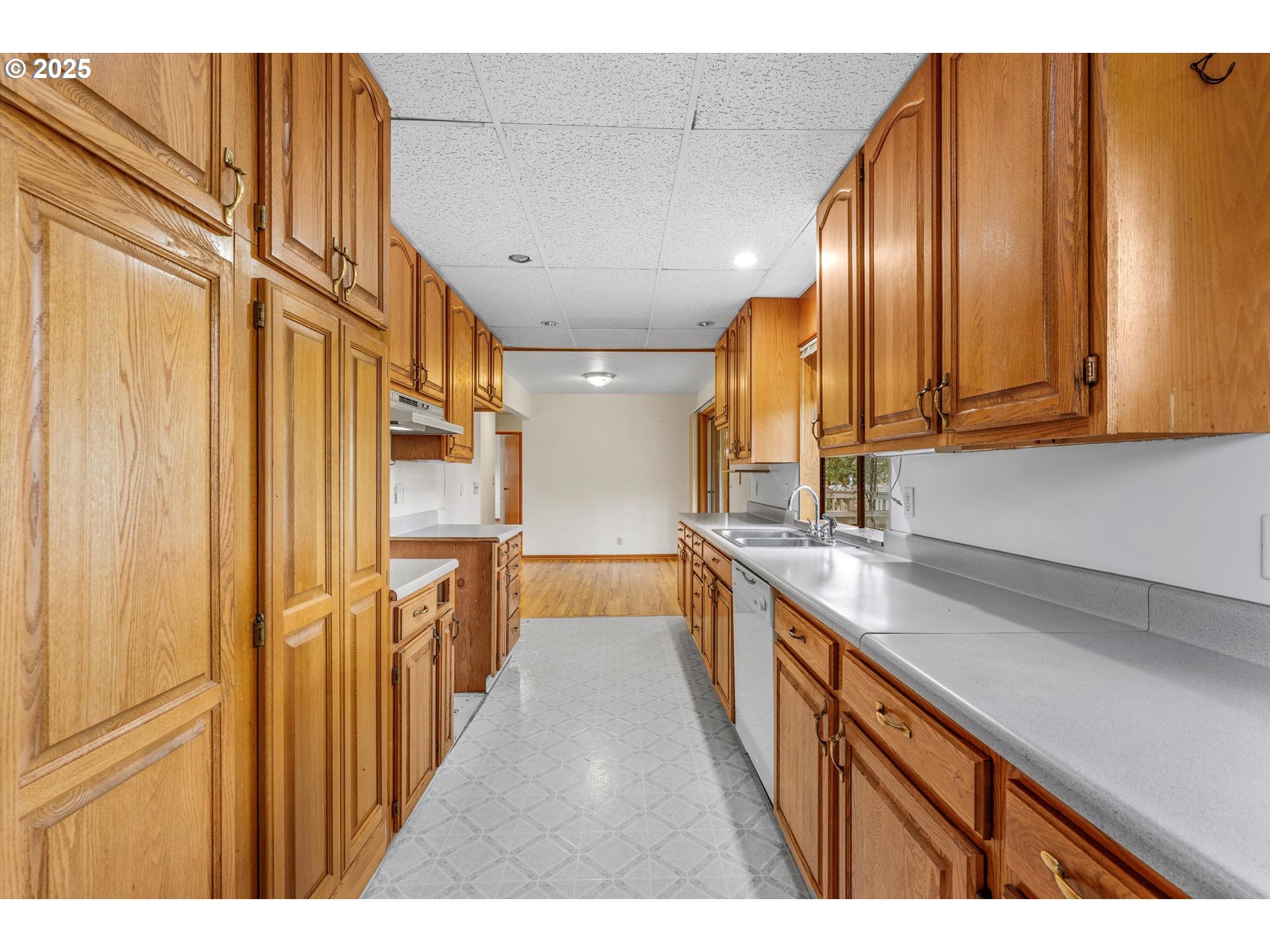 15051 Southeast Bluff Road Sandy, OR 97055 - Photo 14 of 41 a view of a kitchen with stainless steel appliances granite countertop furniture a stove top oven
