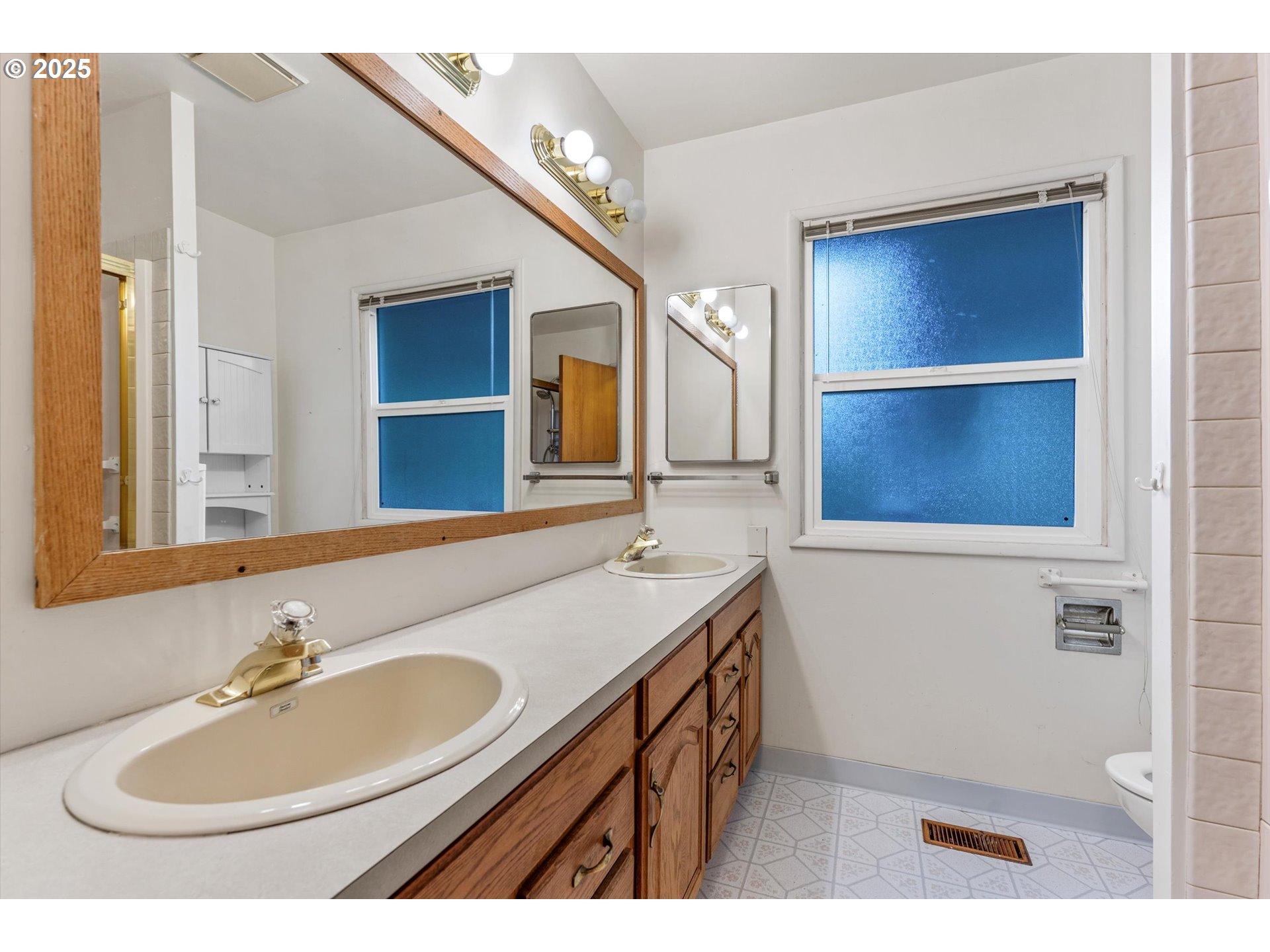 15051 Southeast Bluff Road Sandy, OR 97055 - Photo 17 of 41 a bathroom with a sink and a mirror