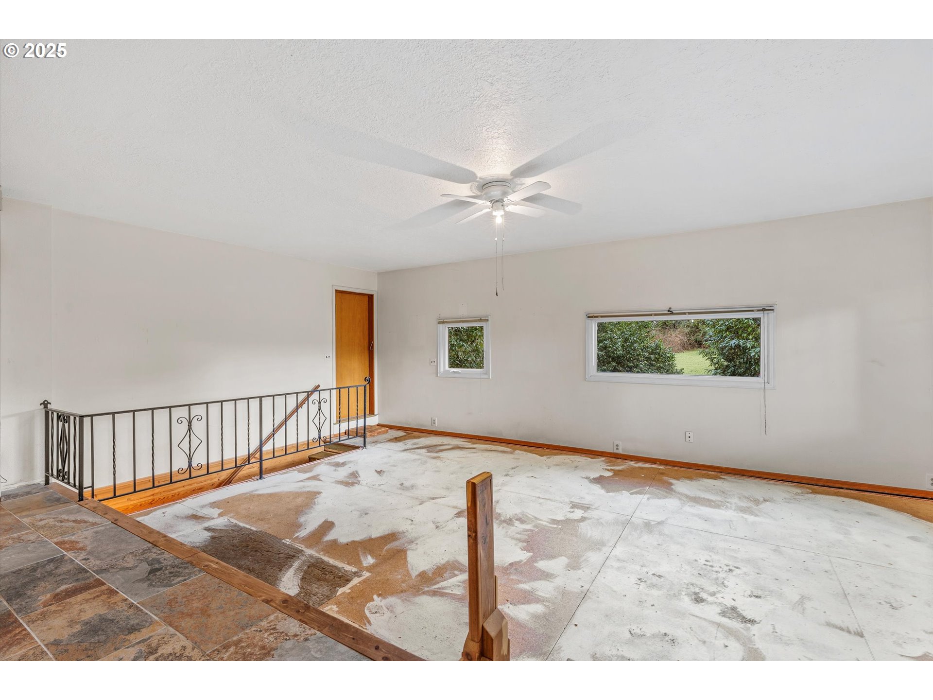 15051 Southeast Bluff Road Sandy, OR 97055 - Photo 23 of 41 a view of a bedroom with a ceiling fan