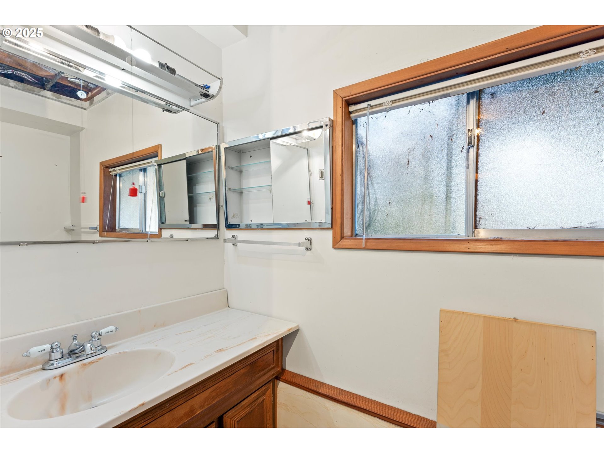 15051 Southeast Bluff Road Sandy, OR 97055 - Photo 27 of 41 a bathroom with a sink and a mirror