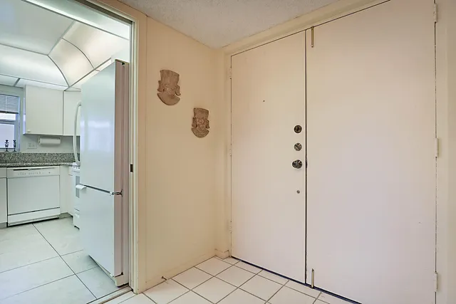 a bathroom with a shower and a sink