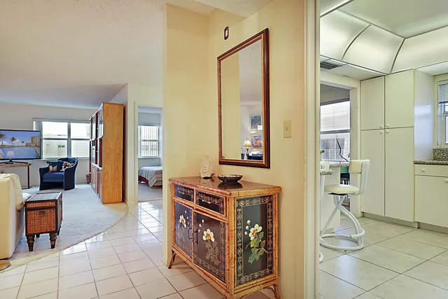 a kitchen with stainless steel appliances granite countertop a stove and a refrigerator