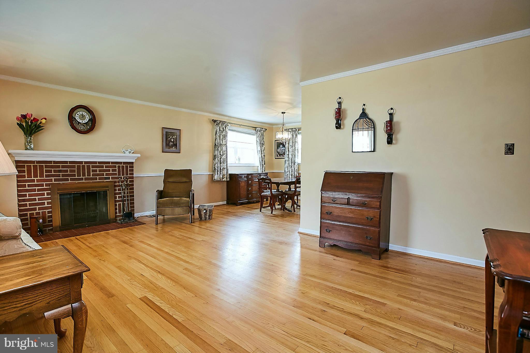 7521 Inzer Street Springfield, VA 22151 - Photo 3 of 30 Living Room w/Wood-Burning Fireplace