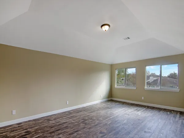 an empty room with windows