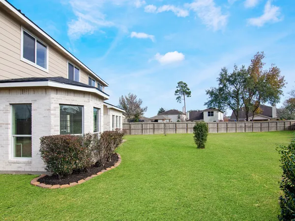 a house view with a garden space