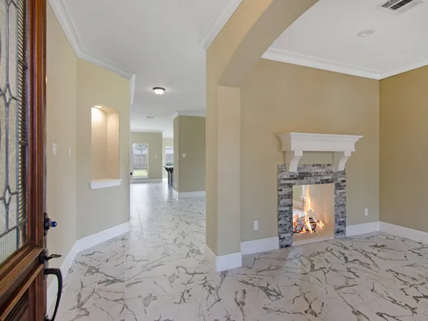 a view of a bathroom with a tub and shower