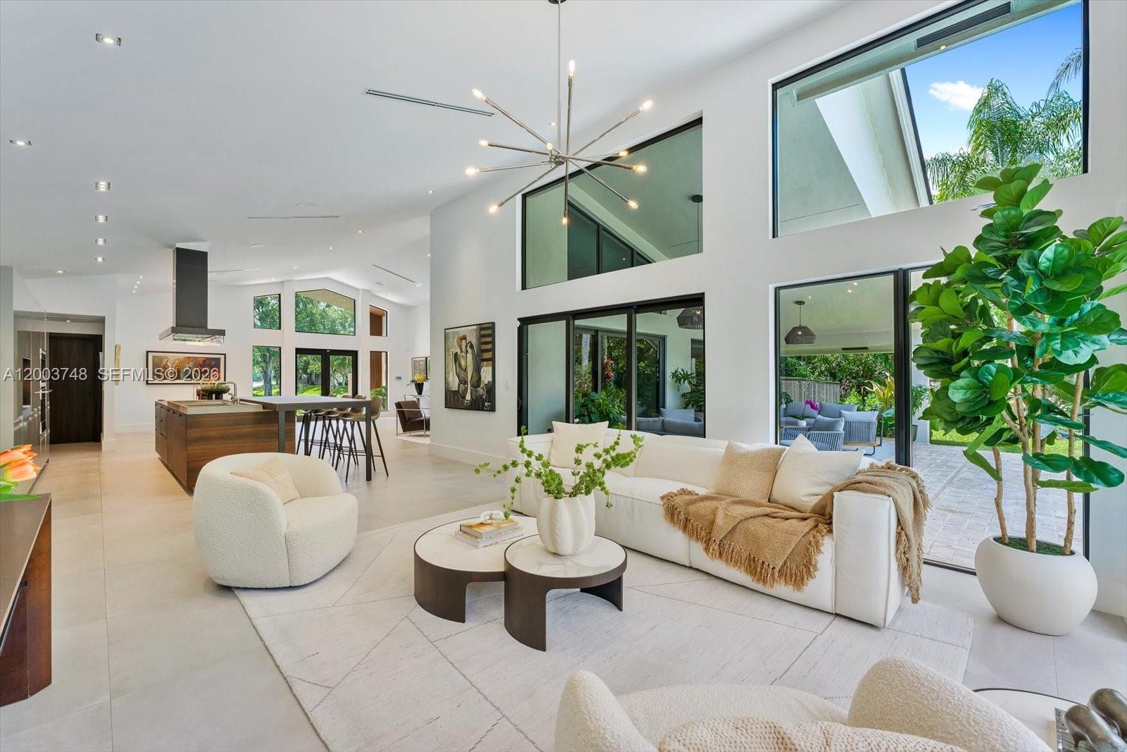 2675 Hackney Road Weston, FL 33331 - Photo 18 of 61 a living room with furniture and a large window