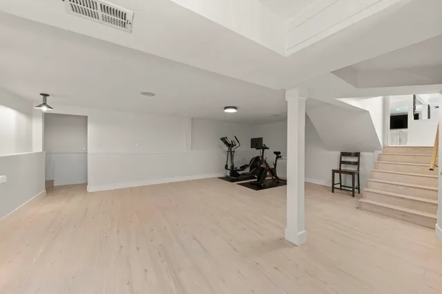 a view of a livingroom with furniture and windows