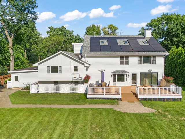 a view of a balcony with wooden floor