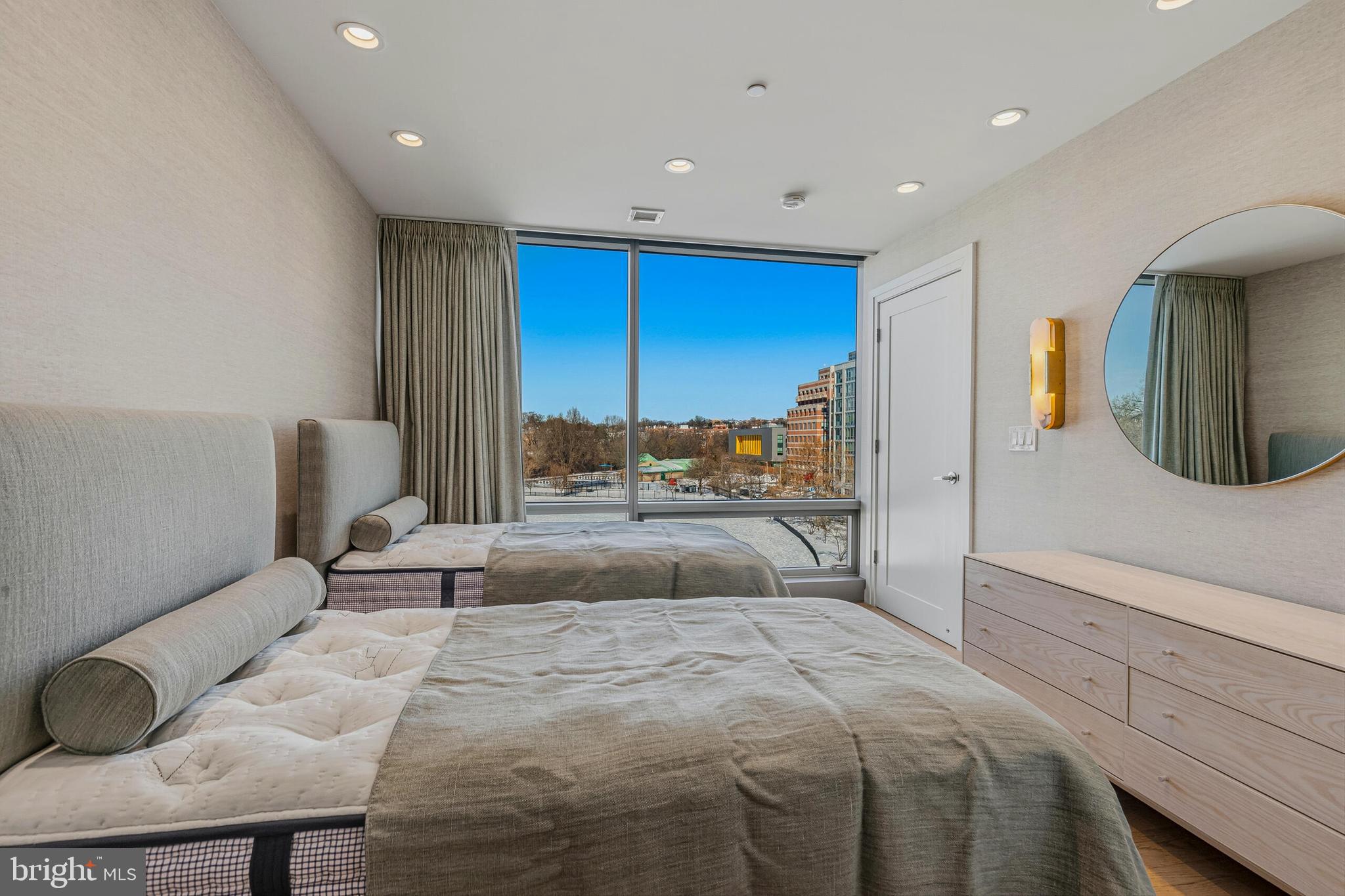 2501 M Street Northwest, Unit 412 Washington, DC 20037 - Photo 21 of 37 2nd Bedroom with Floor to Ceiling Windows